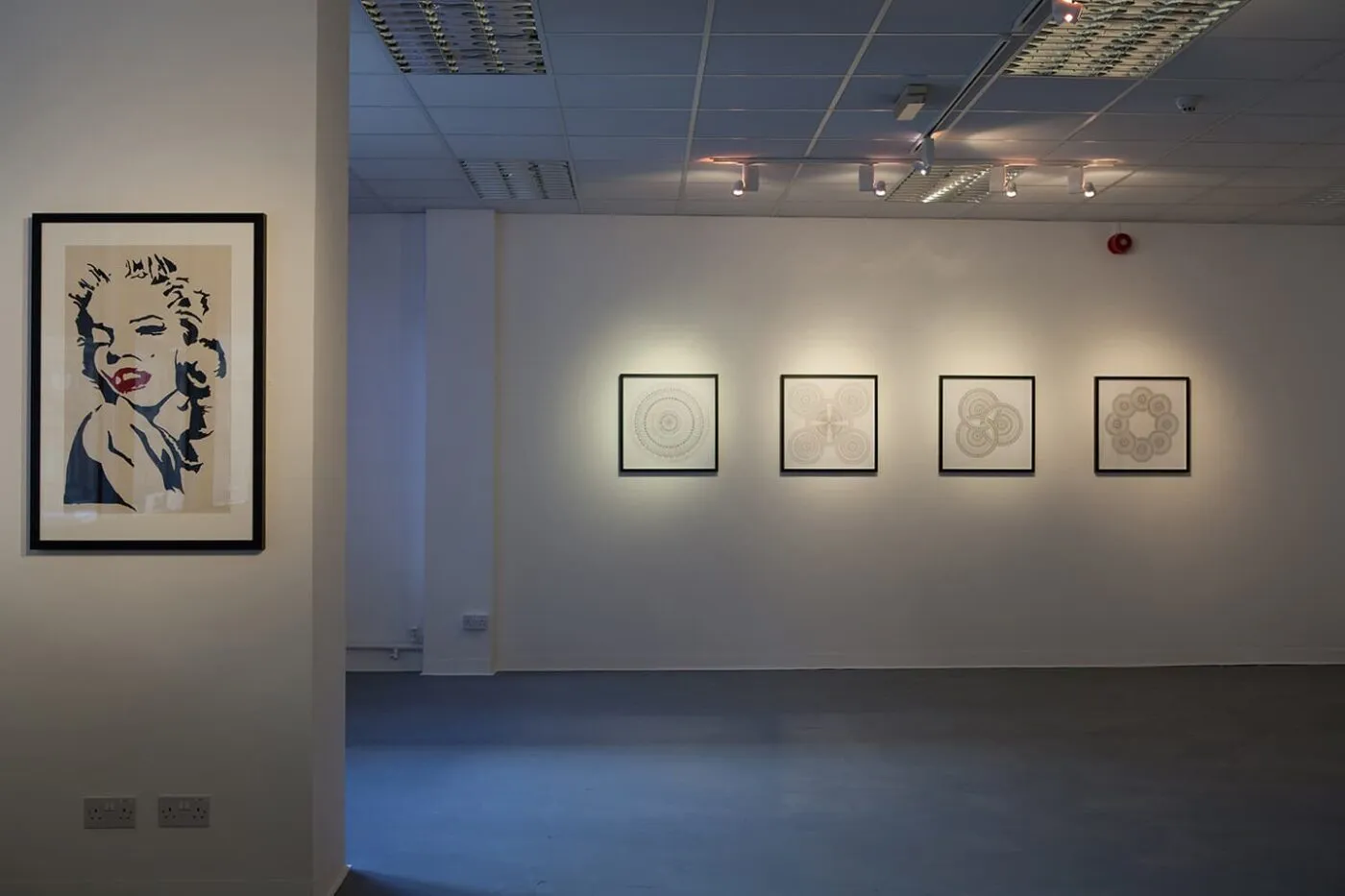 <strong>Reassembling the Self</strong>, installation at Vane showing <i>Left Hand</i>, acrylic on paper, by Kevin Mitchinson and <i>4 Mandalas</i>, ink on paper, by Camille Ormston, Vane, 2012. Image courtesy of Vane.