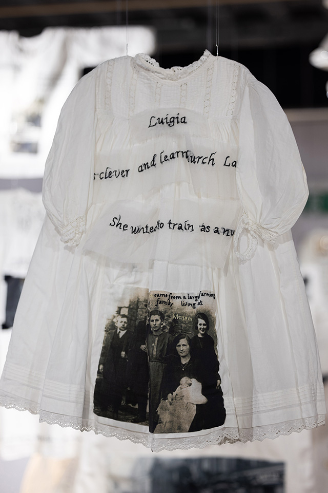 Luigia Pini’s family at Menoni, the family farm near Bardi, 1923. Embroidery by Cecily Winter. Photograph by Scott Murray.